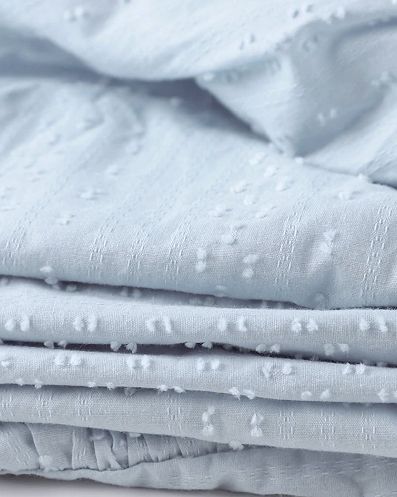 ER | Miniabito dalla linea ariosa con scollo a V, maniche a 3/4 e tasche