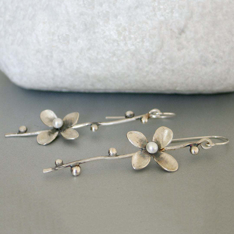 Perla Orecchino classico dal fascino senza tempo