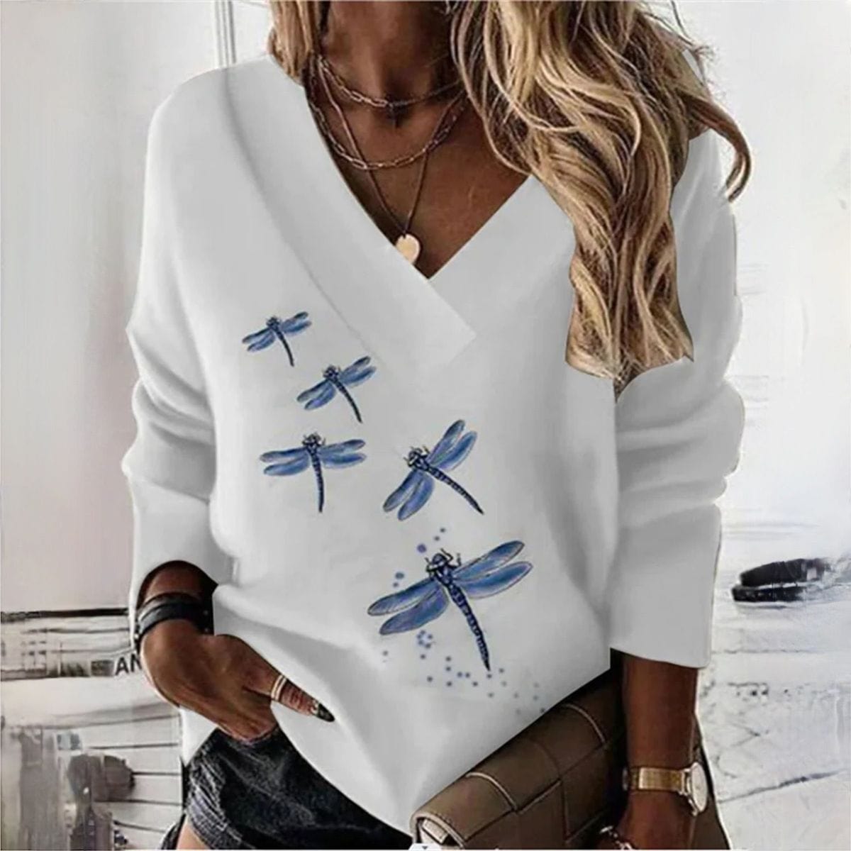 LP | Elegante maglione a forma di libellula