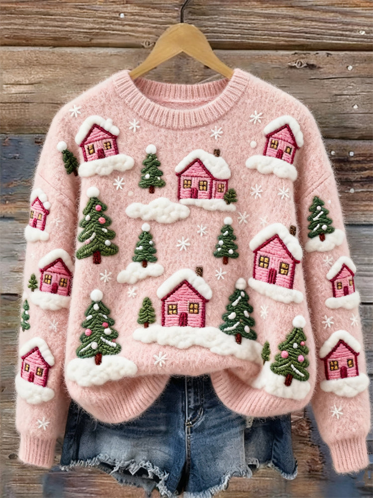 Maglione in cotone con case di villaggio rosa e alberi sempreverdi