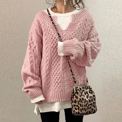 Maglione a trecce in cotone con scollo a chiave e pannelli a texture miste