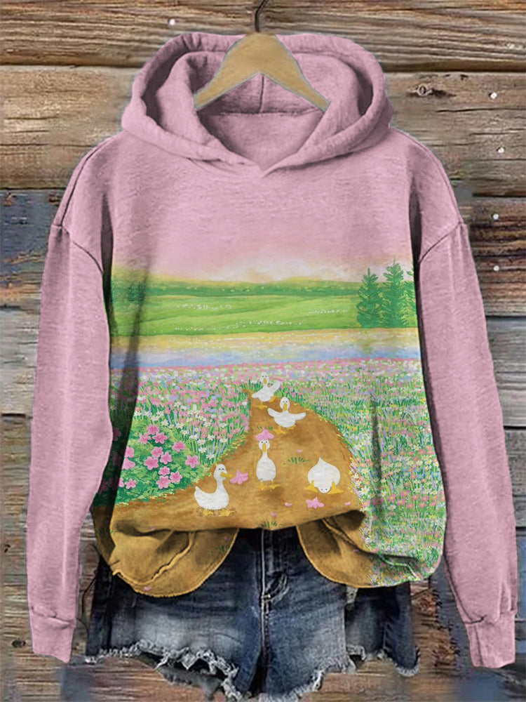 Lovely Ducks In Floral Field Art Cozy Hoodie artswardrobe