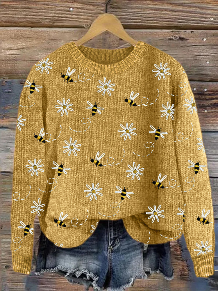 Maglione lavorato a maglia con ricamo di margherite e api