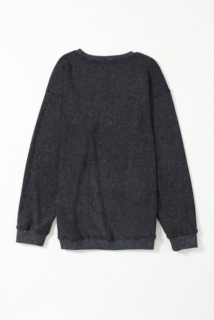 Maglione dal design curato
