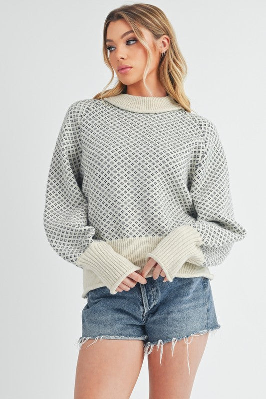 Maglione dal design curato
