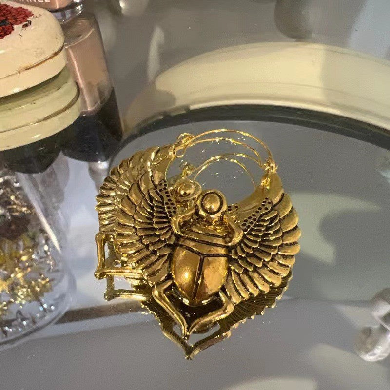 Oro Orecchino artigianale delicato