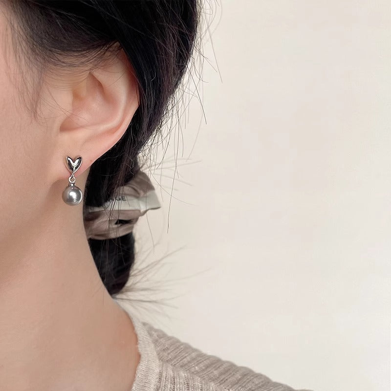 Perla Orecchino classico dal fascino senza tempo