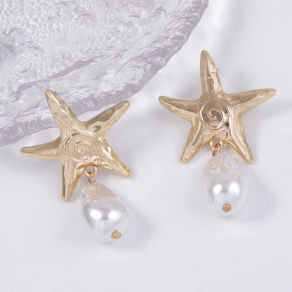 Perla Orecchino artigianale delicato