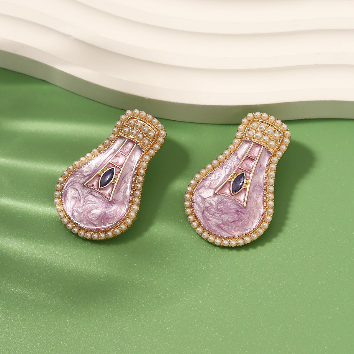 Perla Orecchino artigianale delicato