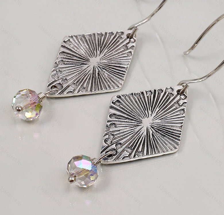 Orecchino artigianale delicato