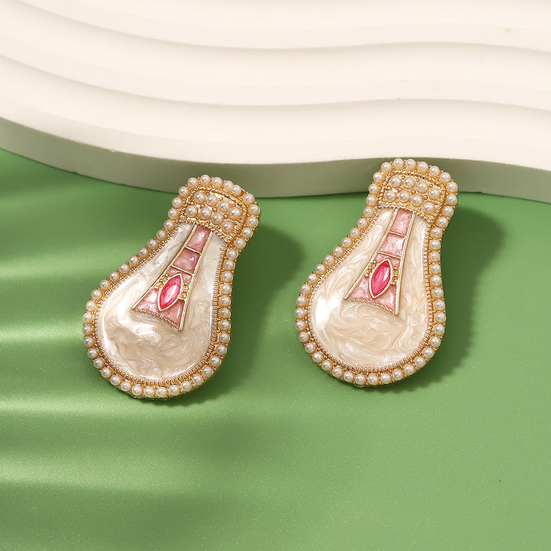 Perla Orecchino artigianale delicato