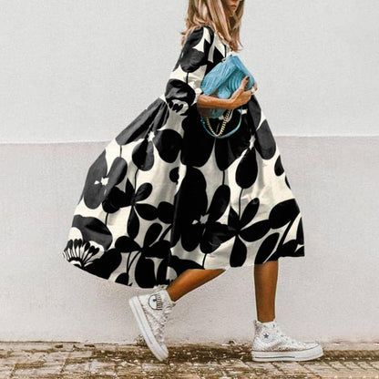 ER | Abito midi stampato con linea ad A