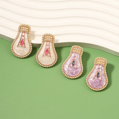 Perla Orecchino artigianale delicato