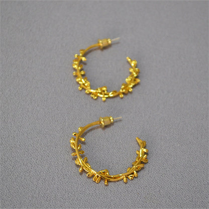 Oro Orecchino bellissimo con stile unico