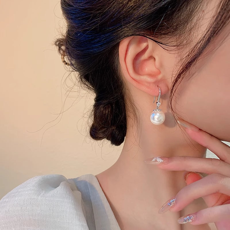 Perla Orecchino classico dal fascino senza tempo