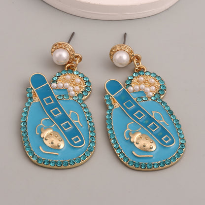 Perla Orecchino artigianale delicato