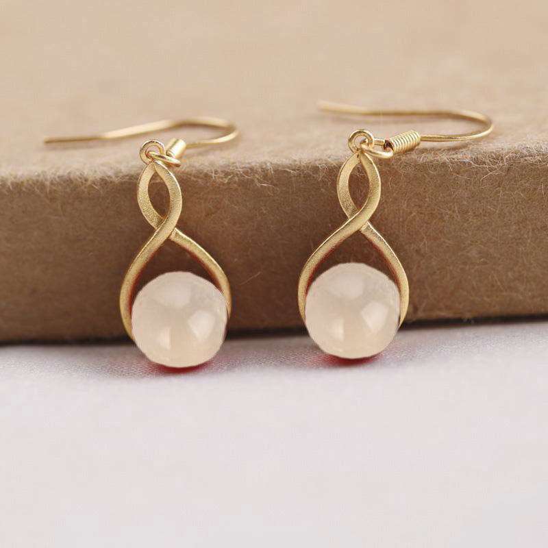 Oro Orecchino bellissimo con stile unico