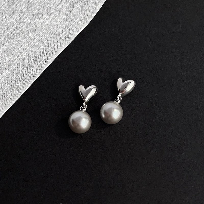 Perla Orecchino classico dal fascino senza tempo