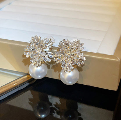 Perla Orecchino classico dal fascino senza tempo