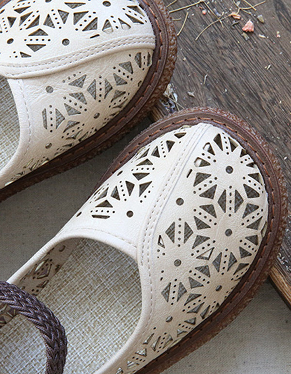 ER | Scarpe slip-on con taglio floreale