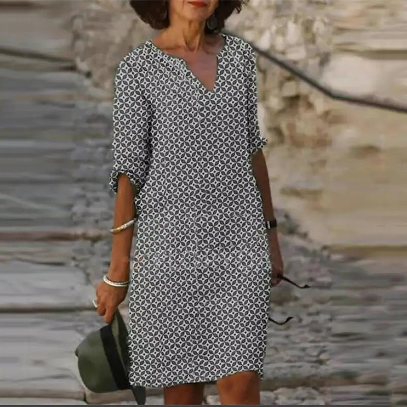 ER | Abito midi con scollo a V