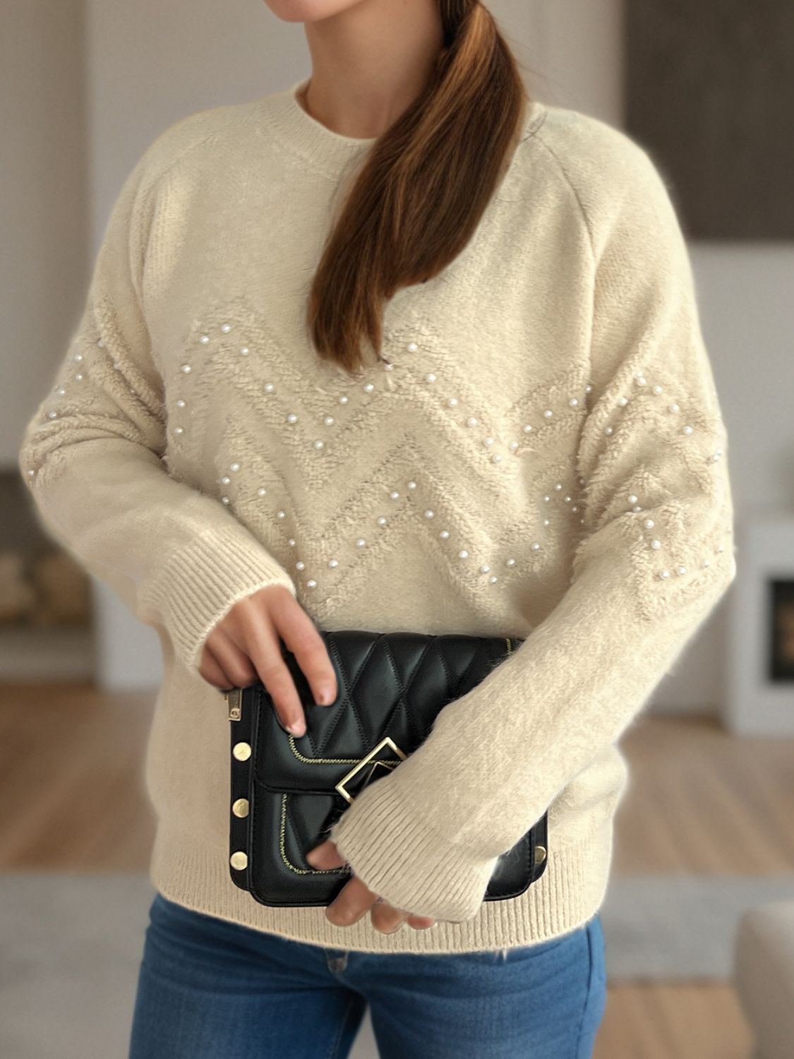 Maglione dal design curato