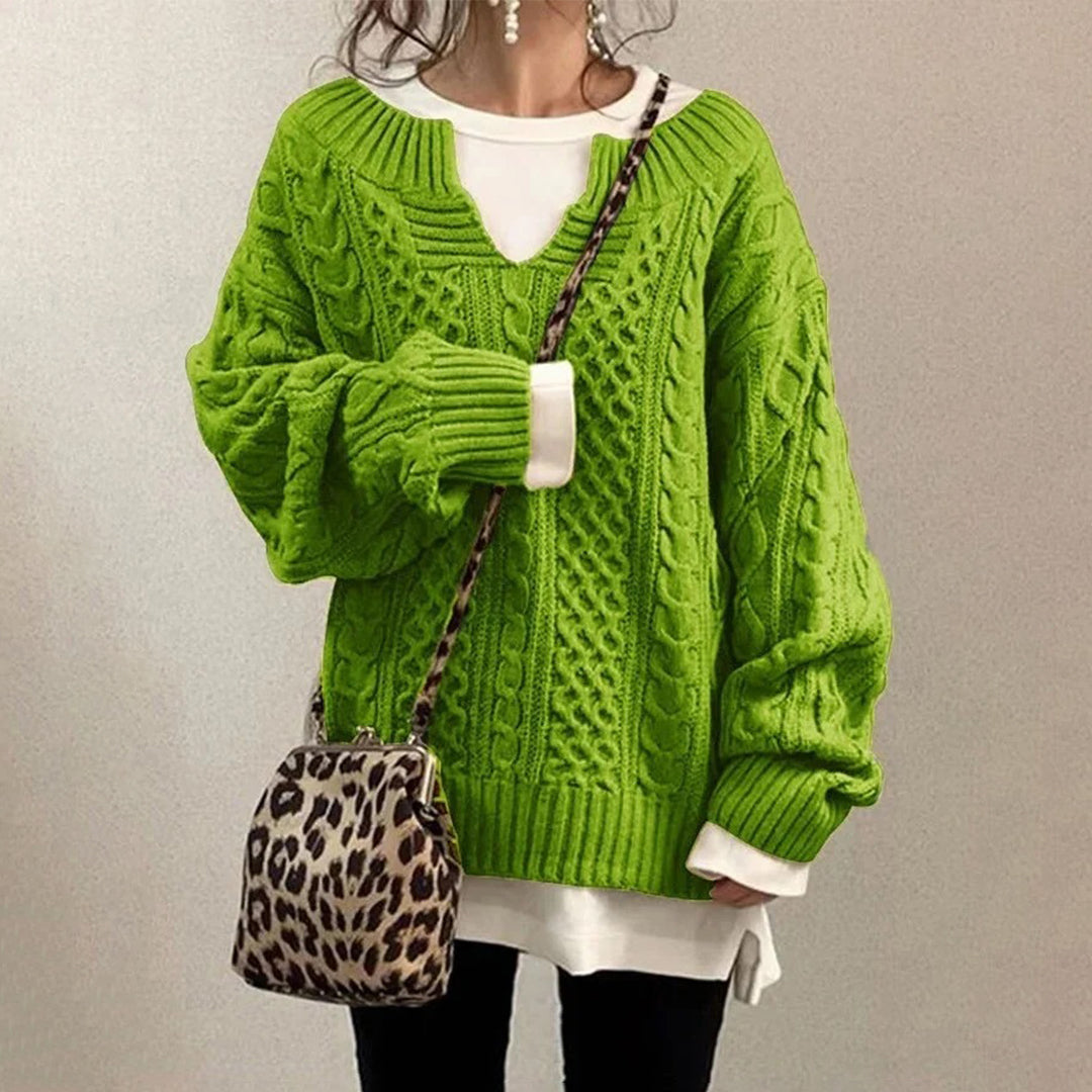 Maglione a trecce in cotone con scollo a chiave e pannelli a texture miste