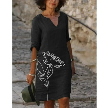 ER | Abito midi con scollo a V e motivo floreale