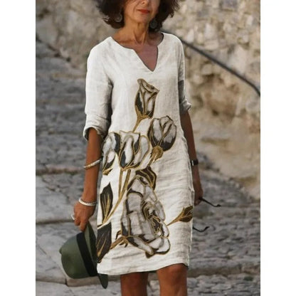 ER | Abito midi con scollo a V e motivo floreale