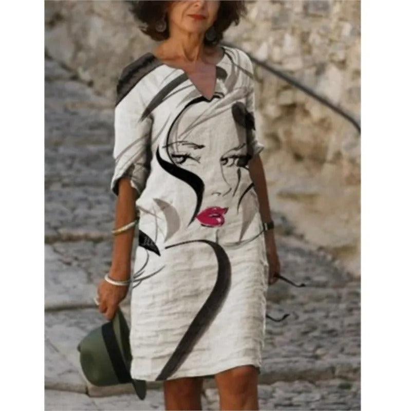 ER | Abito midi con scollo a V e motivo floreale